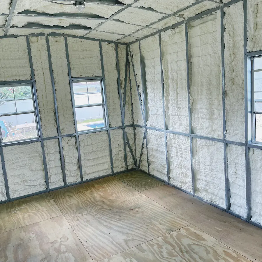 Closed-cell spray foam insulation applied to wall cavities in a residential project in Meraux